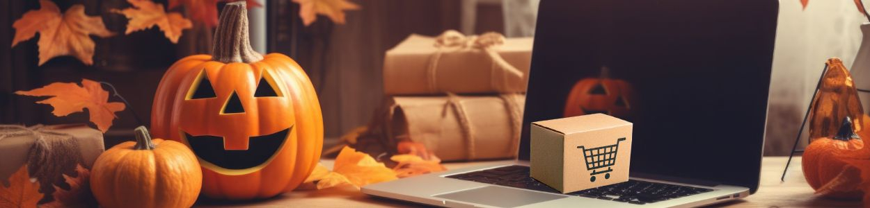 Laptop mit Paket und Kürbis Laptop mit Paket und Kürbis